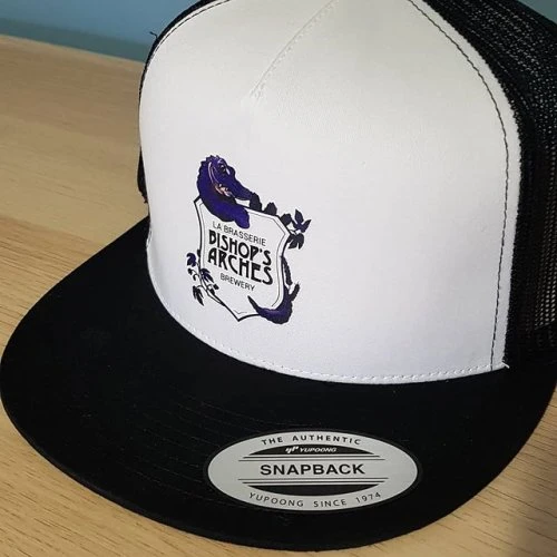 We also do #printed caps! This is a yupoong_basics #snapback #trucker we did for buarchesbrewery - Printed in a 10-pack are just $149 CDN
