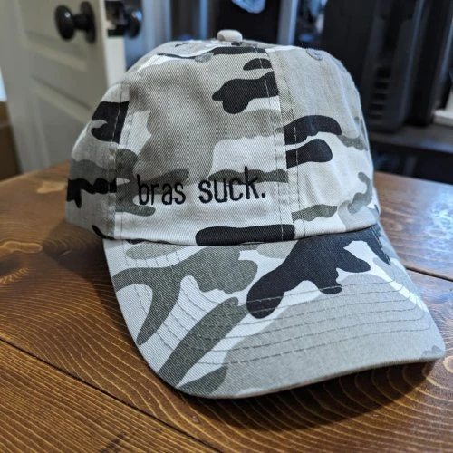 I really enjoy how subtle this looks on the camo hat! This hat is also correct- bras DO suck. Get a custom hat instead!#customapparel #madeincanada #ootd #womensfashion #styleinfluencer